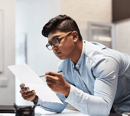 Professional man reviewing health insurance documents